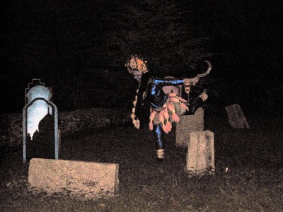 One of the Ghost Train tableaux: An eerie "underworld" figure dances through a graveyard 