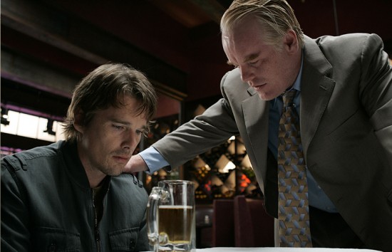 Hoffman (with Ethan Hawke) in Before the Devil Knows You're Dead (2007). 