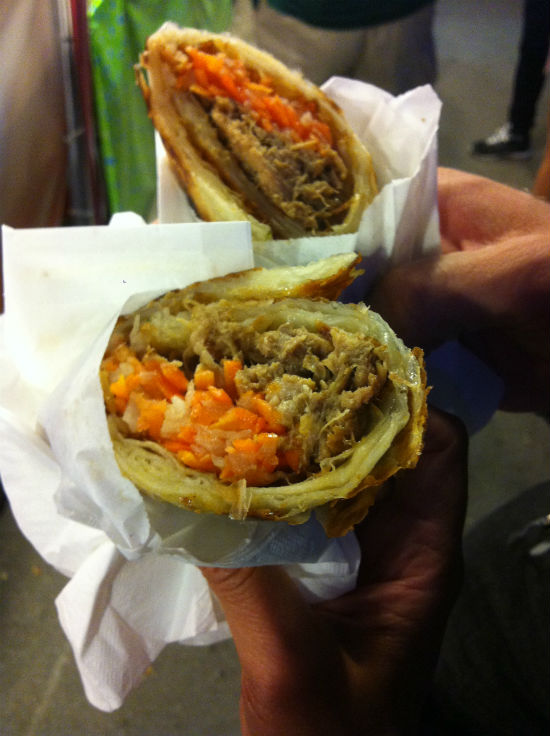 A pork wrap with pickled daikon and carrot. Carolyn Ali photo.