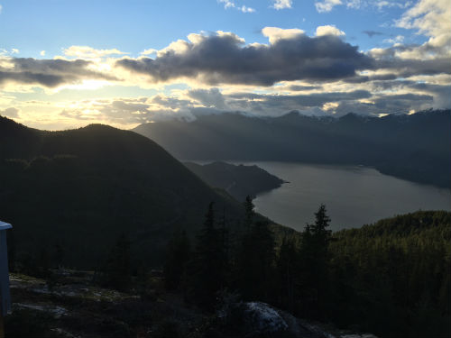 A winter sunset over Howe Sound from the Sea To Sky Gondola lodge deck. Photo credit: Carolyn Ali.