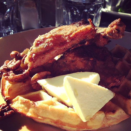 The traditional Two Chefs and a Table chicken and waffles. Photo Credit: Adrien G. | Yelp