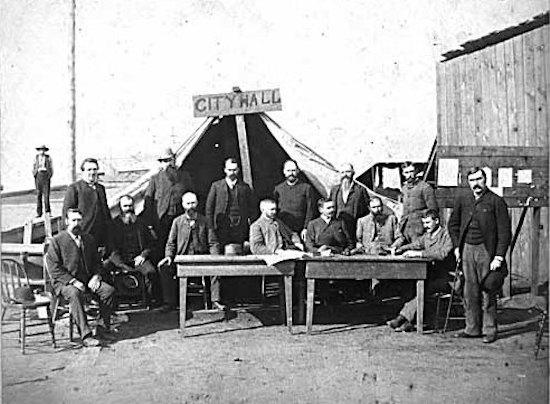 VPL-Photo-508-First-Vancouver-City-council-Meeting-After-the-Fire-1886-H.-T.-Devine