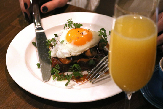 Sunny egg atop mushroom toast; Sourced from Tableau Facebook page