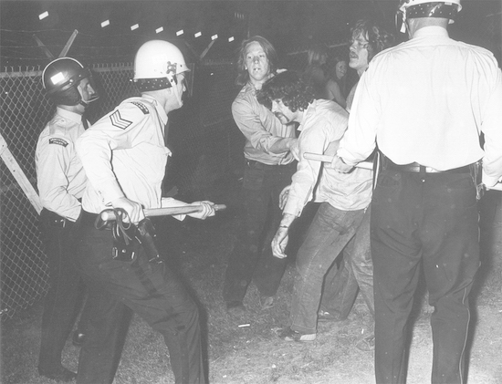 At the height of the chaos, the riot squad pushed the crowd back to Renfrew Street. June 3rd, 1972 PNG Library/Vancouver Sun