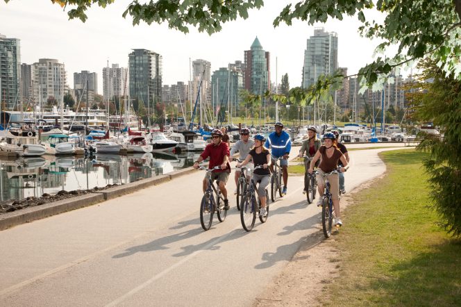 A group of cyclists on the seawall in Vancouver's Stanley Park.