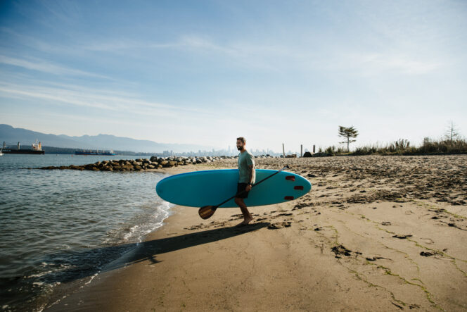 Paddleboarder at Spanish Banks Beach in Vancouver