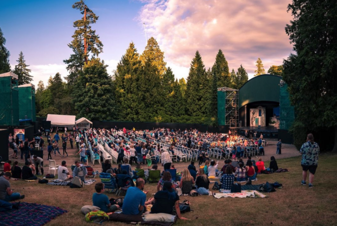 Spectators watch Theatre Under the Stars in Stanley Park