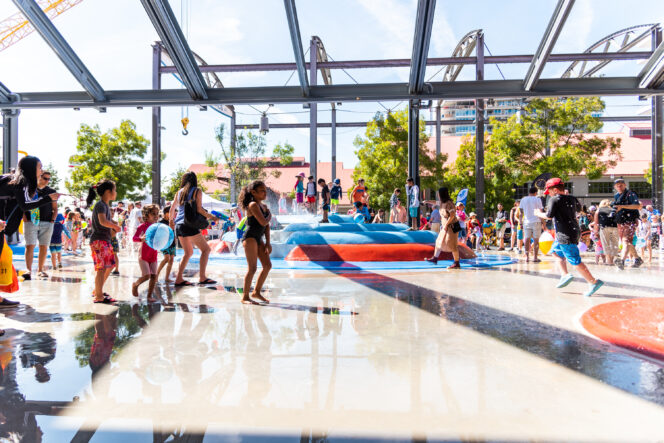 Kids playing at the Shipyards Splash Park in North Vancouver